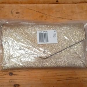 Kate spade cross body gold glitterly bag